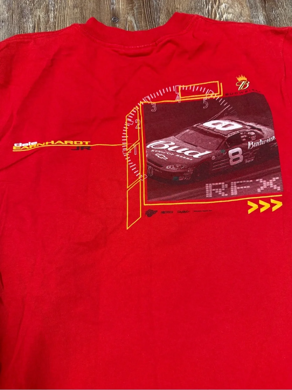 Vintage Red Dale Earnhardt Jr. NASCAR tee with graphic of a race car and the wor